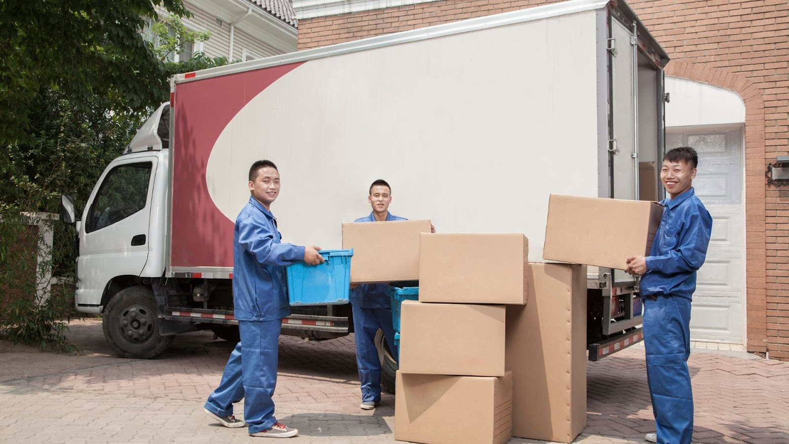 Rajdhani Movers packing fragile items carefully